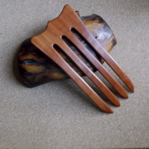 Figured European Pear wood 4 prong hair fork by Jeter and sold in the UK by Longhaired Jewels